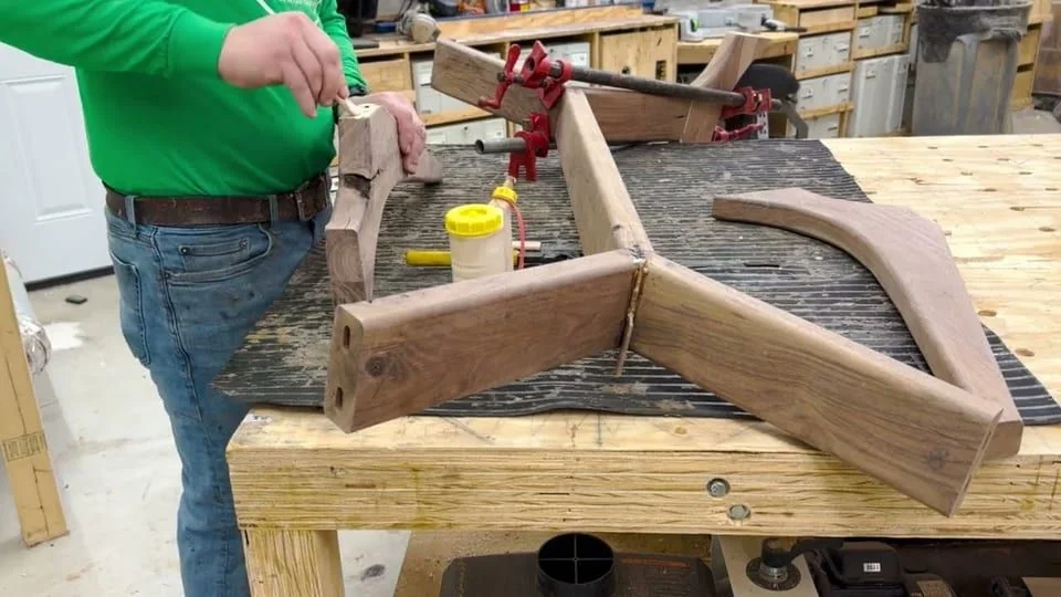 Still from the film “Building a walnut trestle base”.