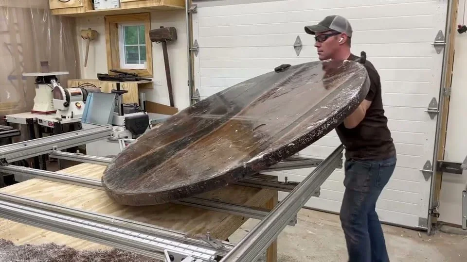Still from the film “A high-gloss epoxy river against a matte round top”.