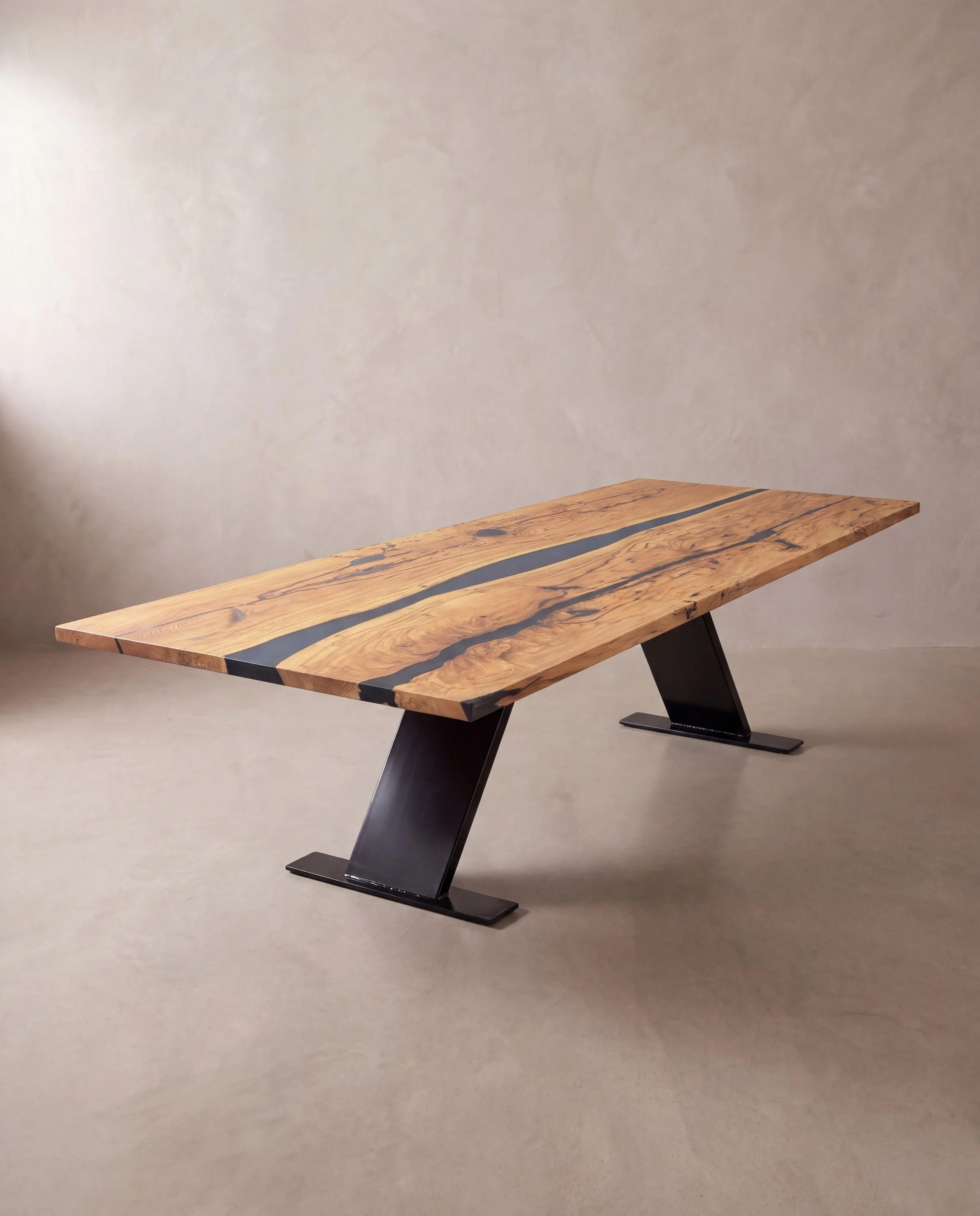 A rendering of a long conference table with a figured pale top and black steel base, in a limewash studio.