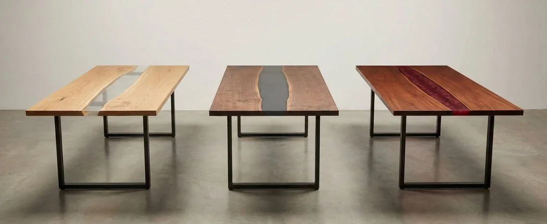 Custom epoxy dining tables showing clear, dark, and colored epoxy resin options